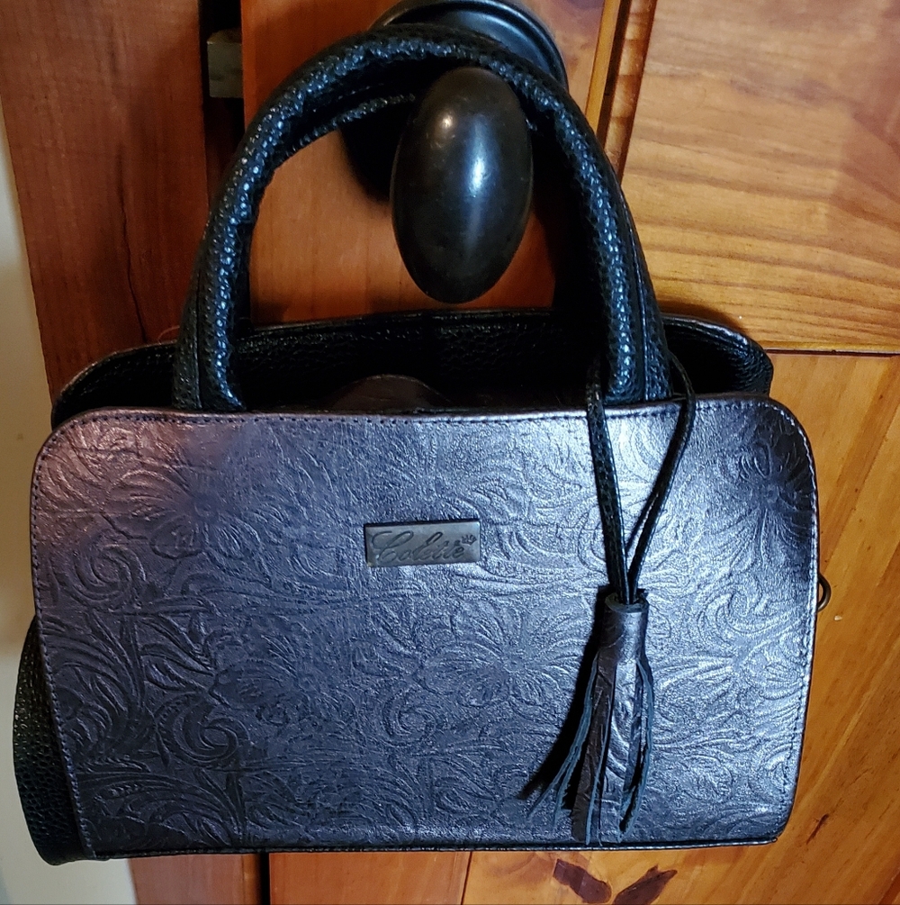 Dark Brown Leather Hand Tooled Handbag Comes With A Strap And Tassel. NWOT